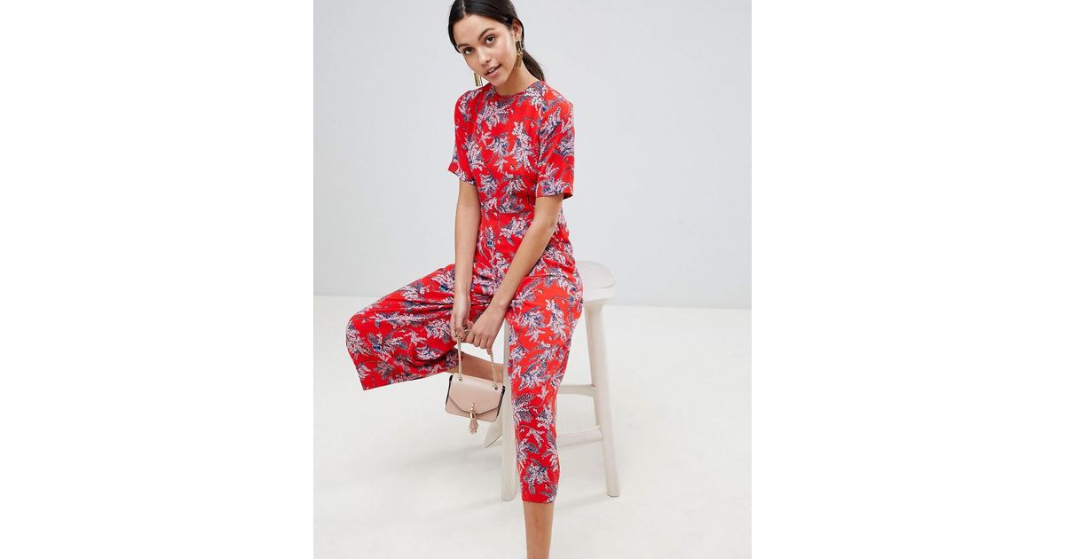 red flowery jumpsuit
