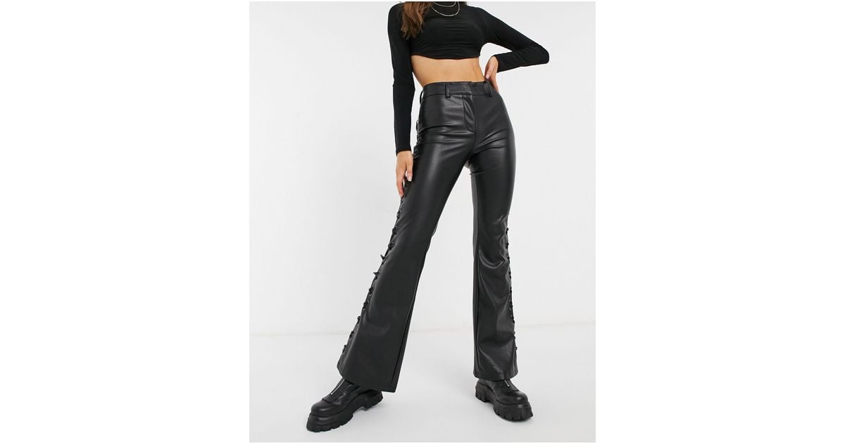 NA-KD high waisted flared faux-leather pants in black