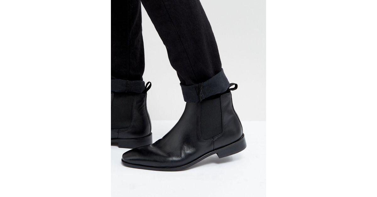 dune flat chelsea boots in black leather