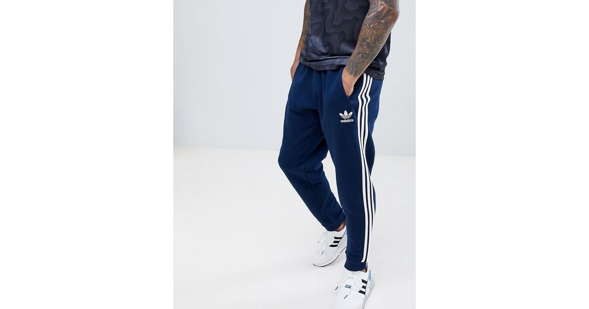 Pantalon de jogging 3 bandes - Bleu marine DJ2118 adidas Originals pour  homme en coloris Bleu | Lyst