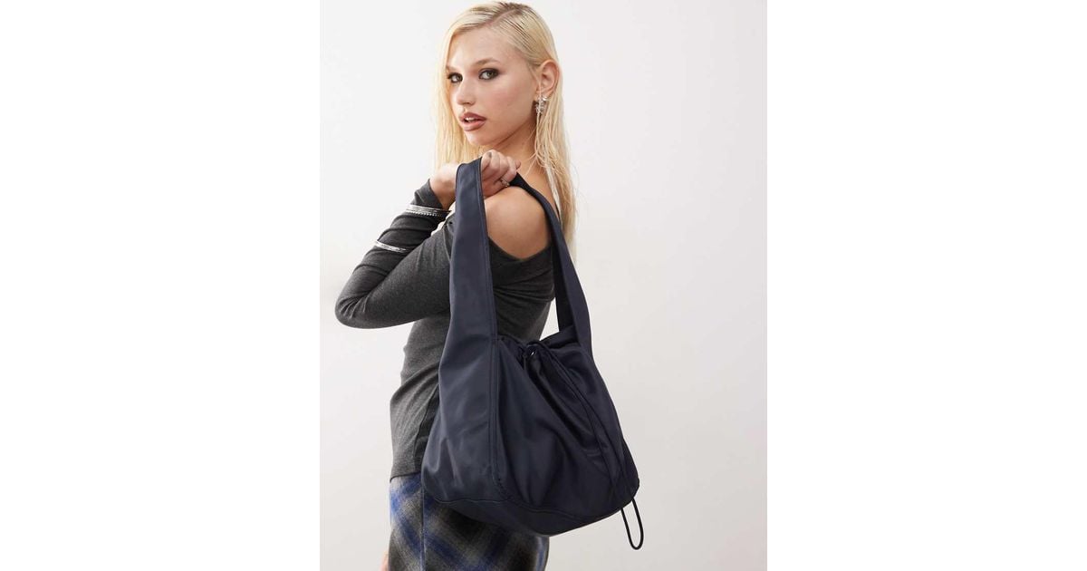 Monki Nylon Shoulder Bag With toggle Detail in Blue Lyst UK