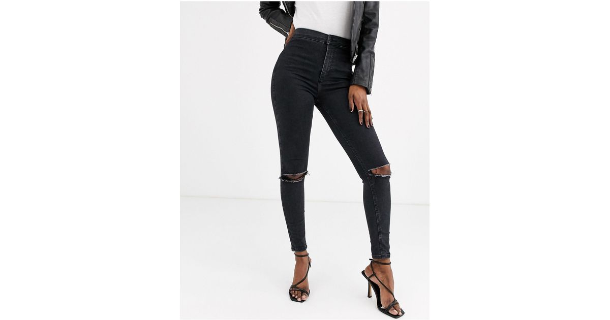 TOPSHOP Joni Skinny Jeans With Rips in Black | Lyst