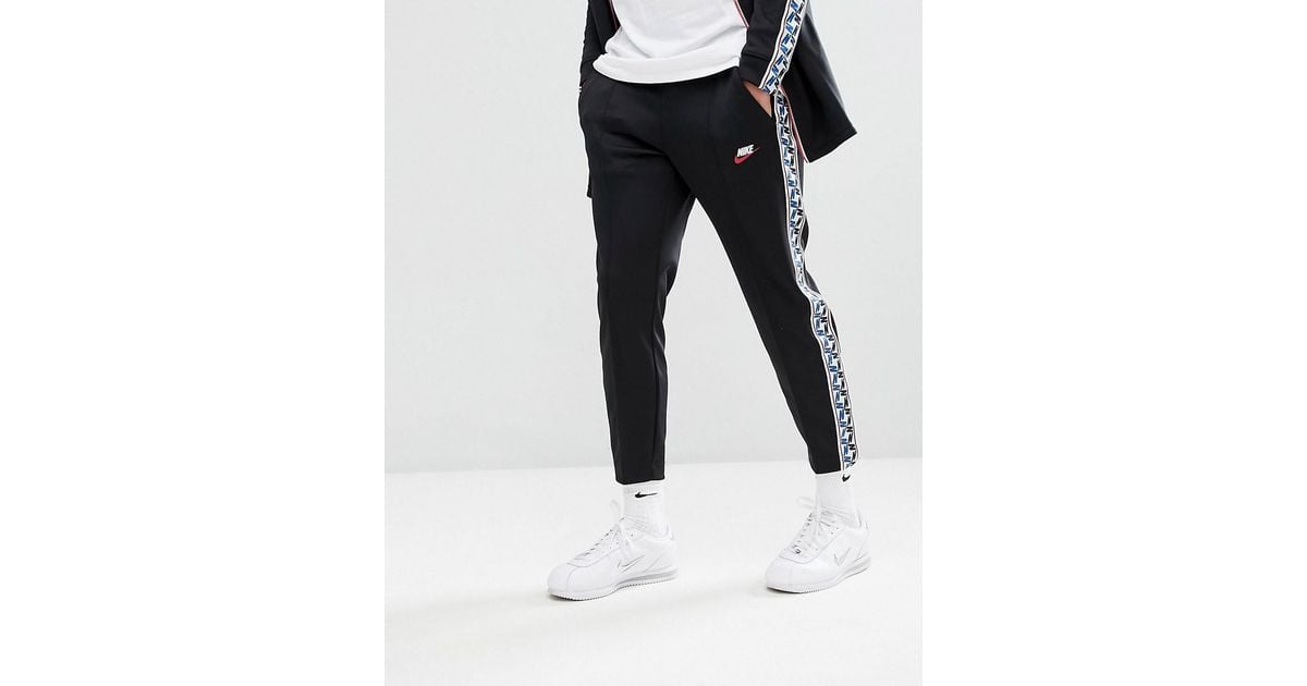 nike joggers with side stripe