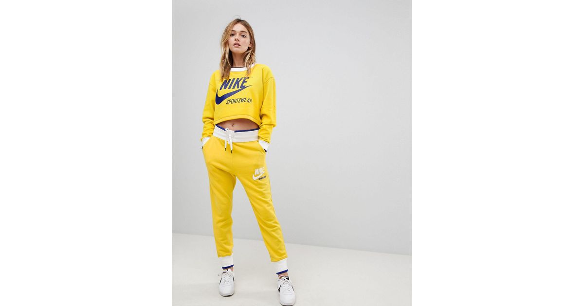 yellow nike joggers womens