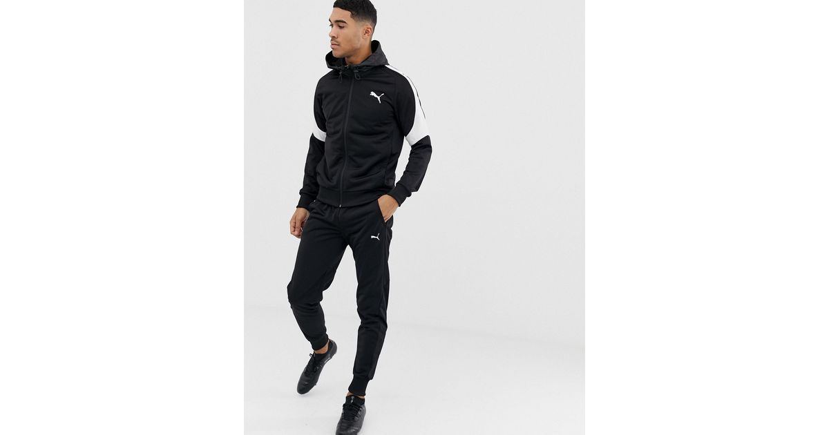 EVOstripe - Tuta neraPUMA in Materiale sintetico da Uomo colore Nero | Lyst