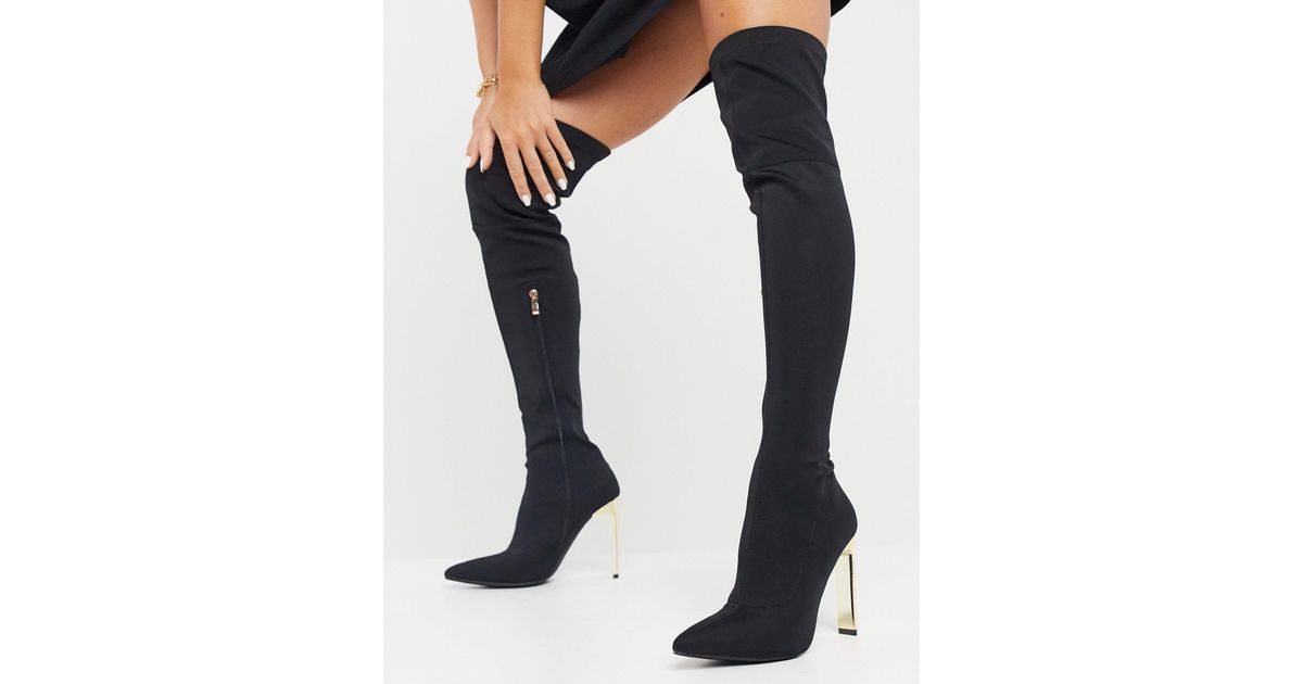 SIMMI Shoes Simmi - London Liane - Over-de-knie-stretchlaarzen Met Gouden  Hak in het Zwart | Lyst NL
