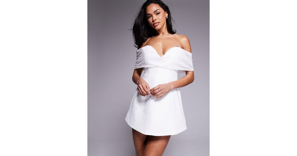 Murci Exclusive Polka Dot Mesh Bardot Plunge Neck Mini Dress In White murci-exclusive-polka-dot-mesh-bardot-plunge-neck-mini-dress-in-white