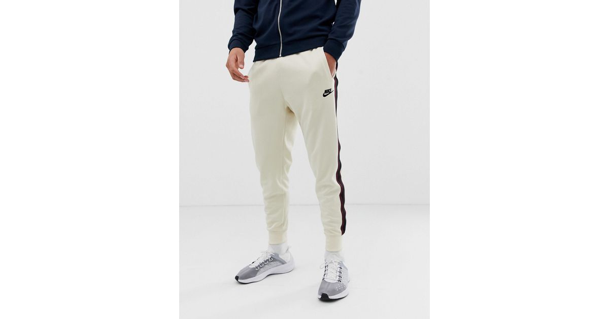 Nike Katoen Tribute - Joggingbroek in het Naturel voor heren - Lyst