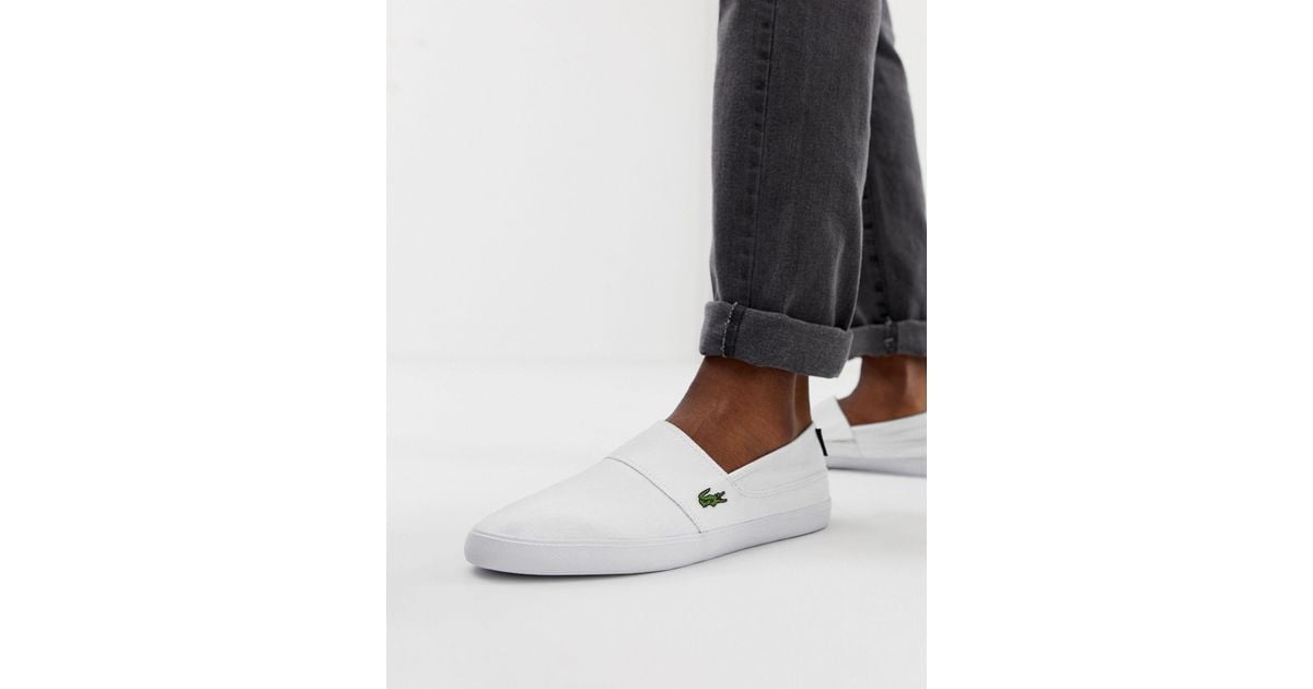 Lacoste – Marice – Stoffschuhe zum Hineinschlüpfen in Weiß für