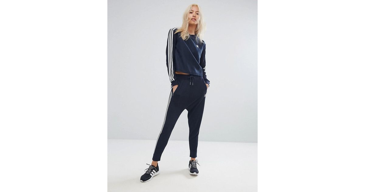 Adidas Originals Blue Originals Three Stripe Low Crotch Knitted Trouser In Navy Adidas Originals Blue Originals Three Stripe Low Crotch Knitted Trouser In Navy