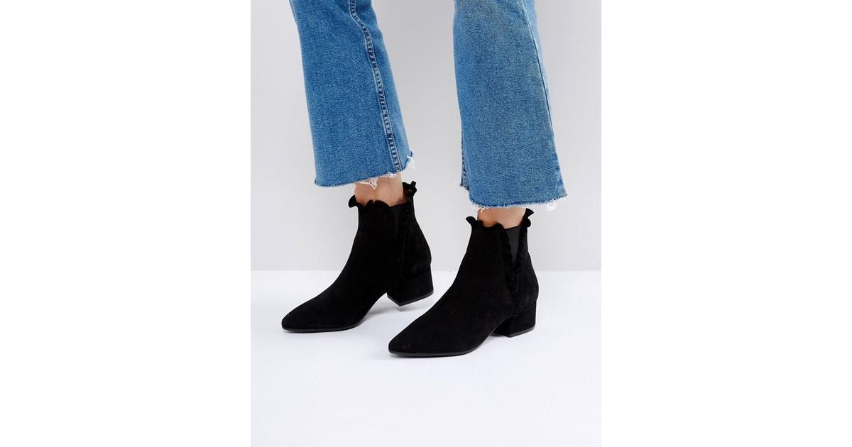 black ruffle ankle boots