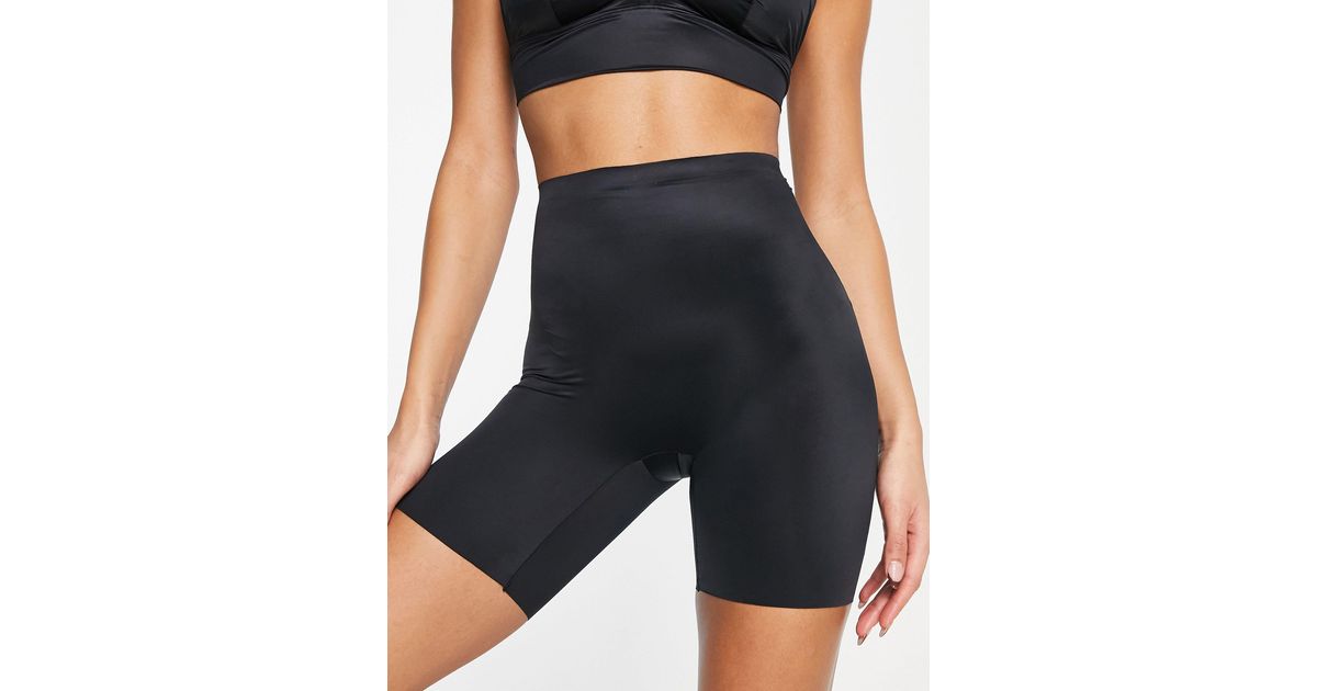 Spanx Shaping Satin Short With Tummy Smoothing Detail in Black | Lyst