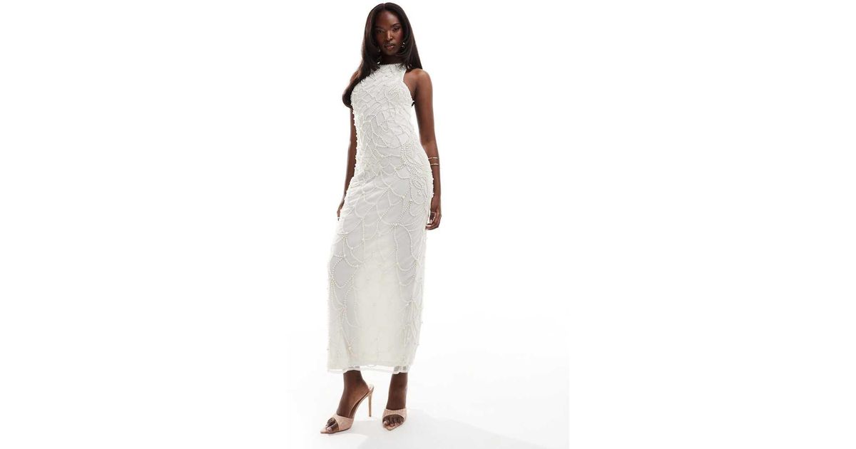 asos white halter neck dress ASOS DESIGN disc sequin halter mini dress in white