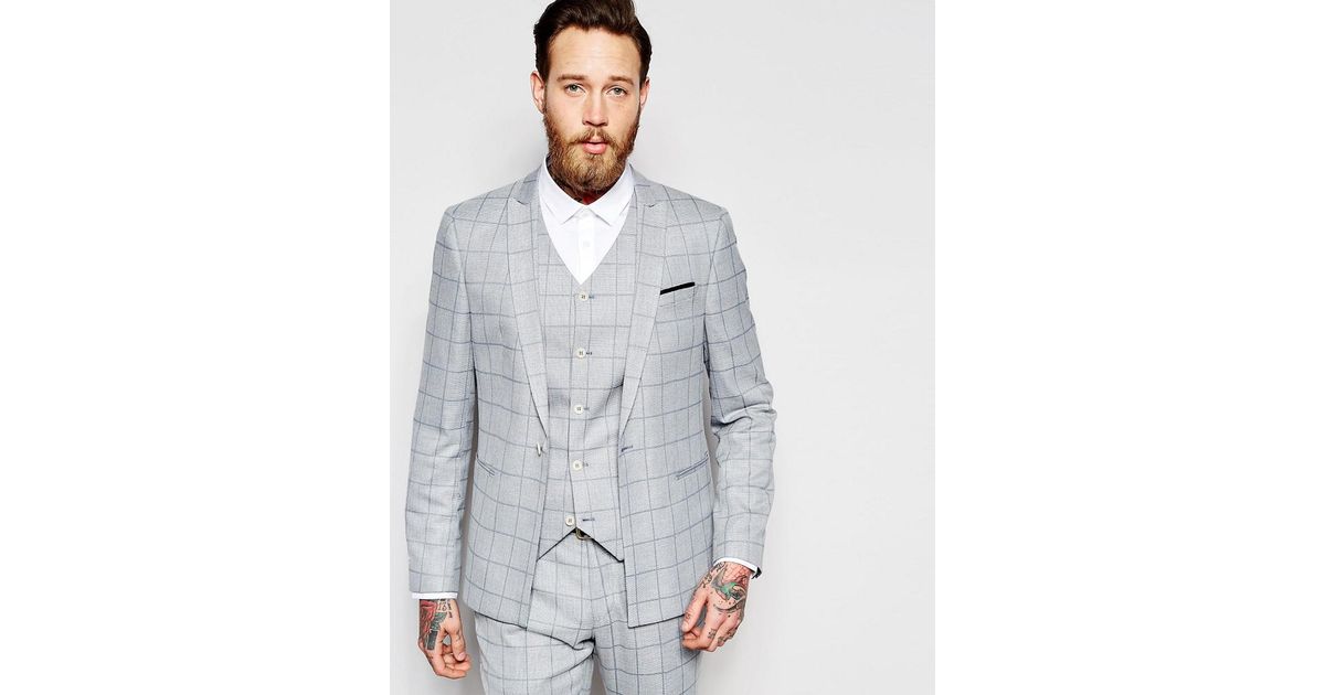 light blue skinny suit