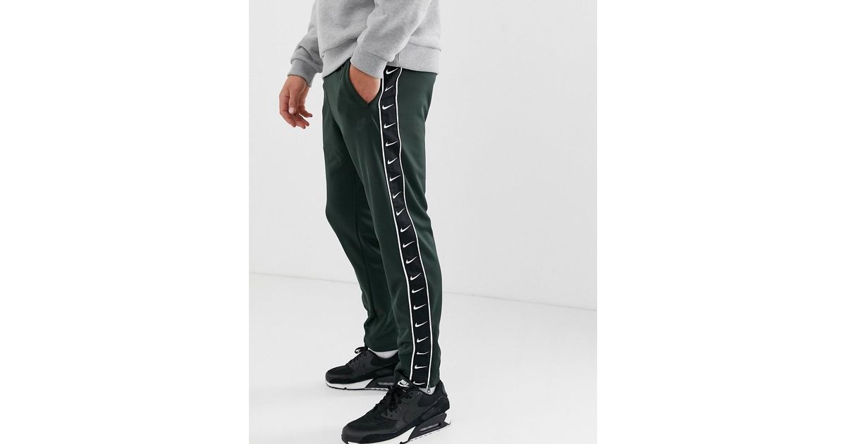 green nike sweatpants