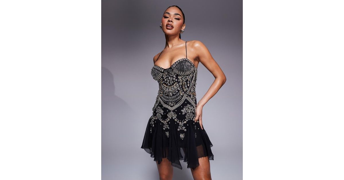 embellished cami mini dress with flippy hem in black asos Topshop cami mini slip dress with faux shell embroidery and embellishment  in black