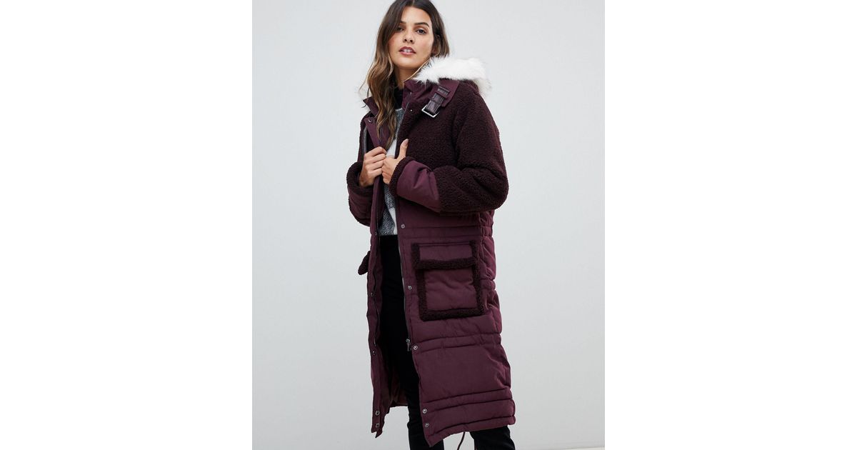 red parka with fur hood