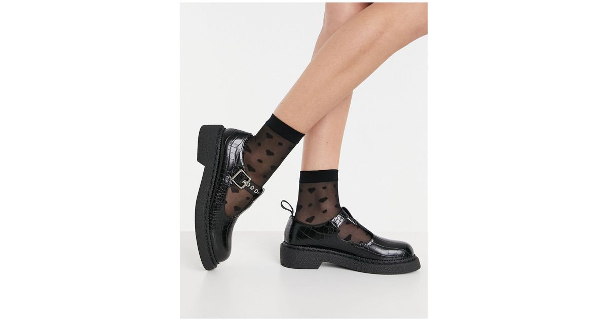 Zapatos negros planos estilo merceditas tipo cocodrilo LAMODA de color  Negro | Lyst