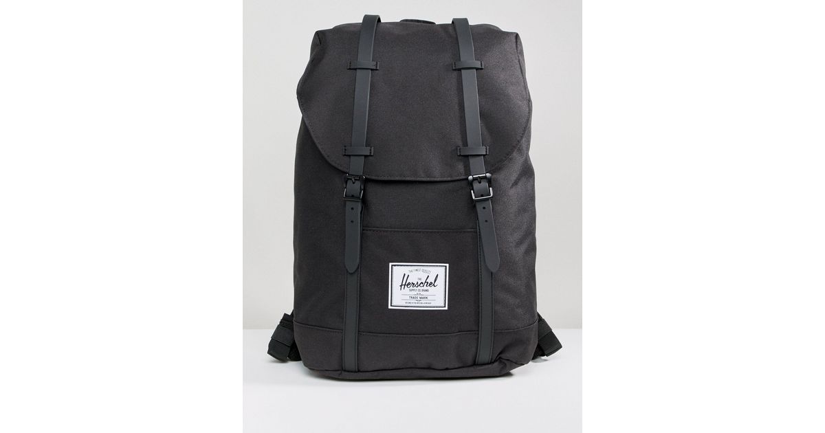 herschel supply co retreat backpack in black with rubberised straps