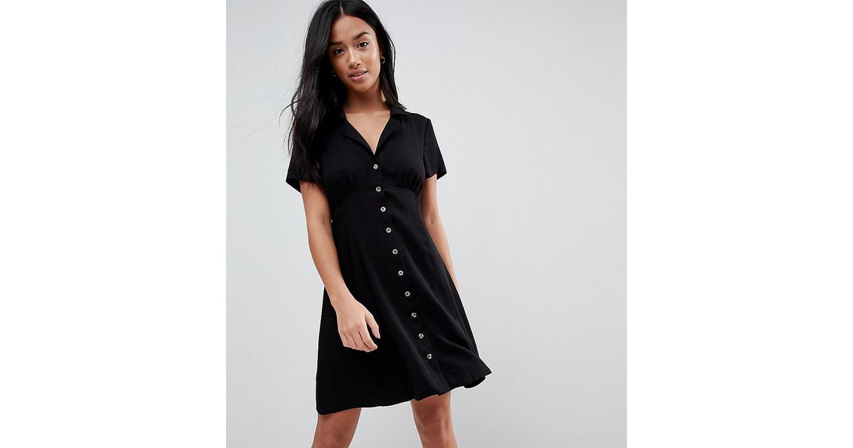 black button skater dress