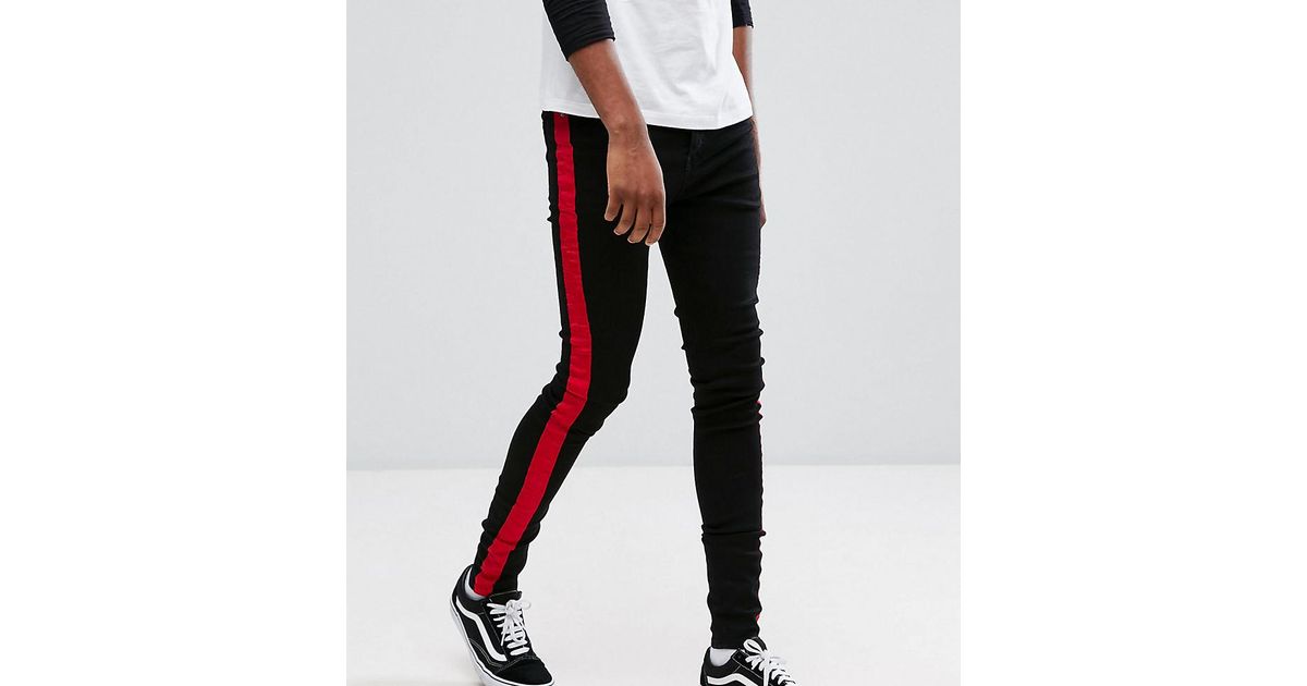 black skinny jeans with red stripe