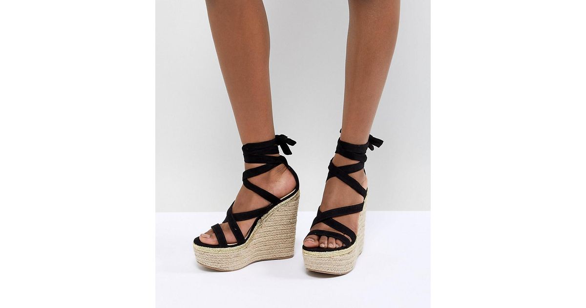 asos design trophy tie leg high wedges
