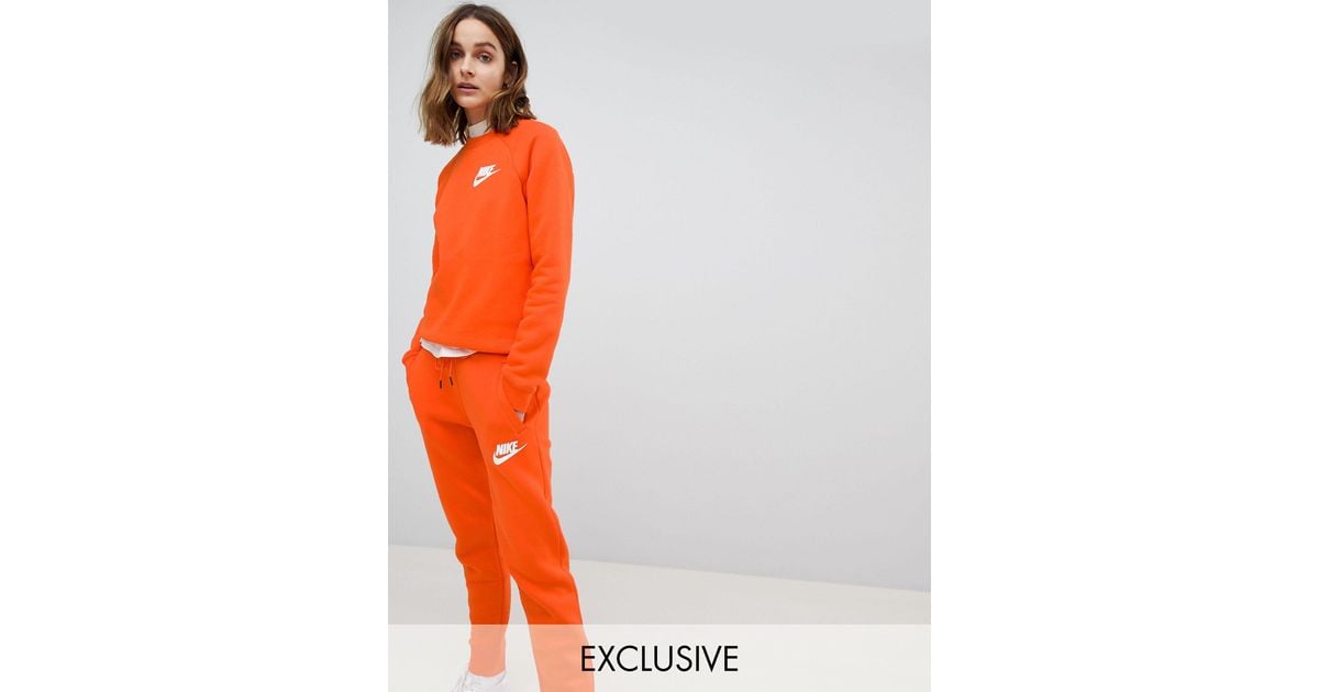 Rally Pantalon Nike en coloris Orange Lyst