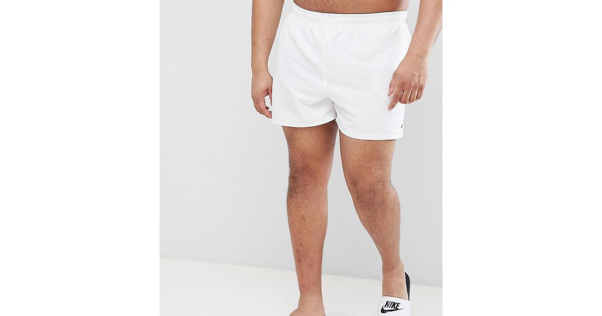white nike swim shorts