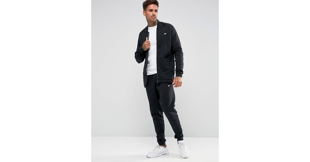 grey nike modern tracksuit