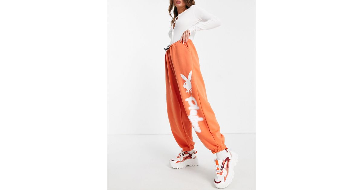 X playboy - jogger oversize Missguided en coloris Orange | Lyst