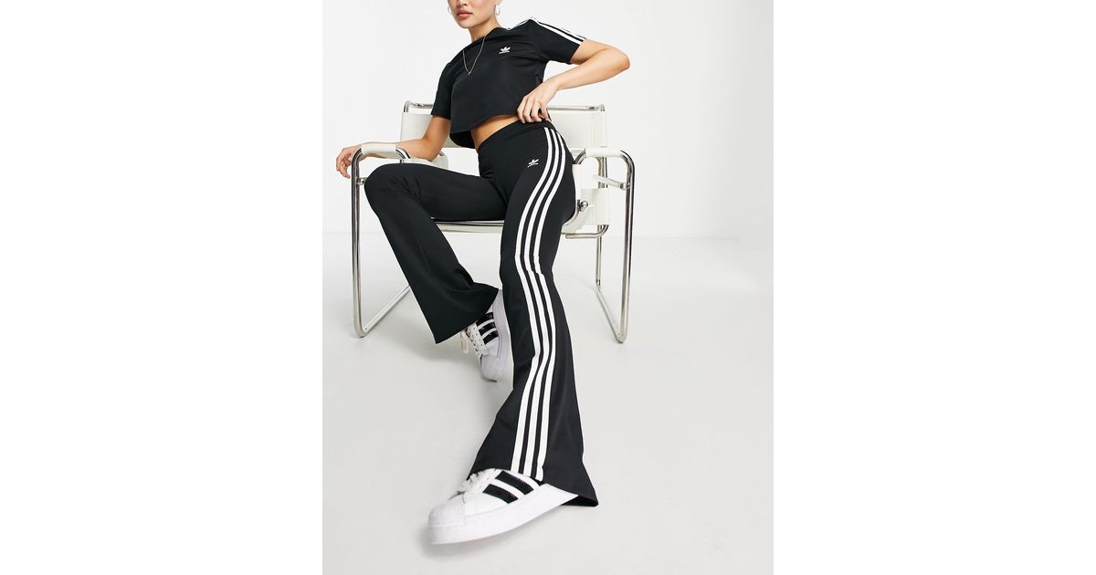 adidas Originals Adicolor Three Stripe Flared leggings in Black (White ...