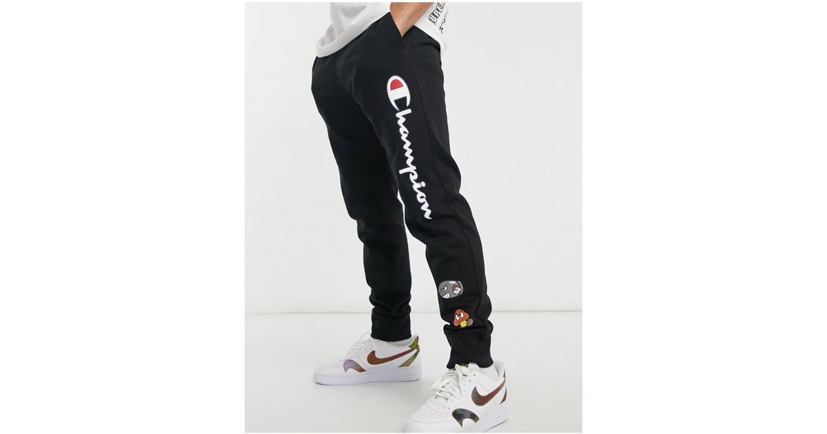Champion X Super Mario joggers in Black 