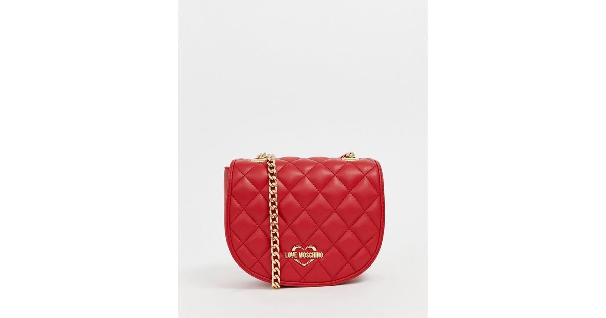 red bag with gold chain