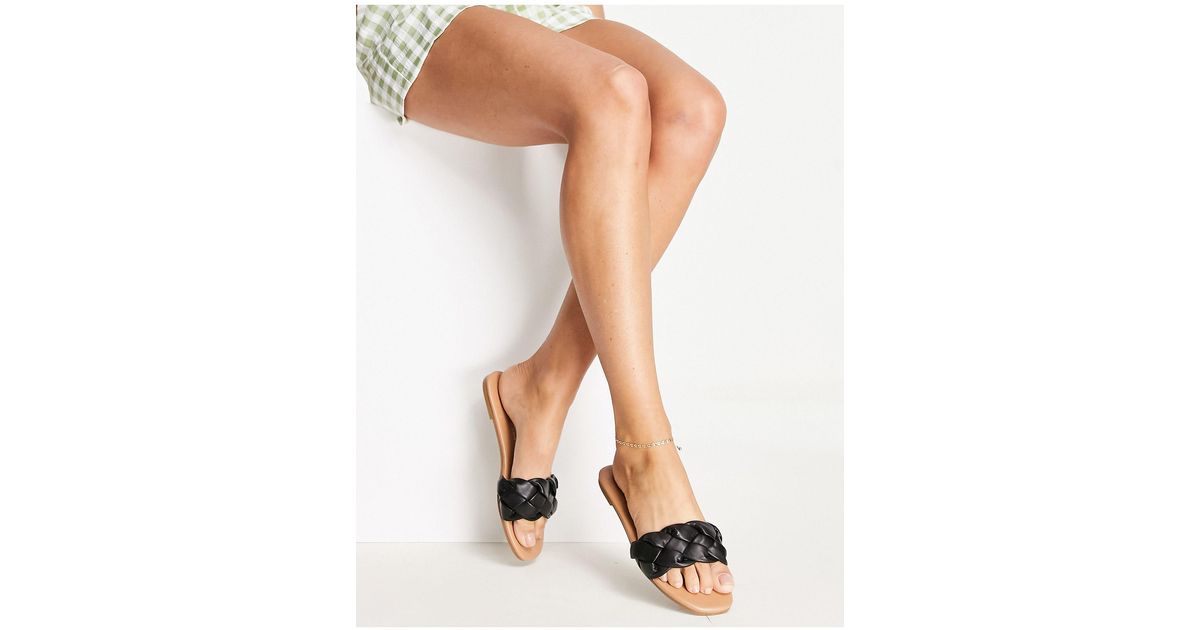 black plaited mules
