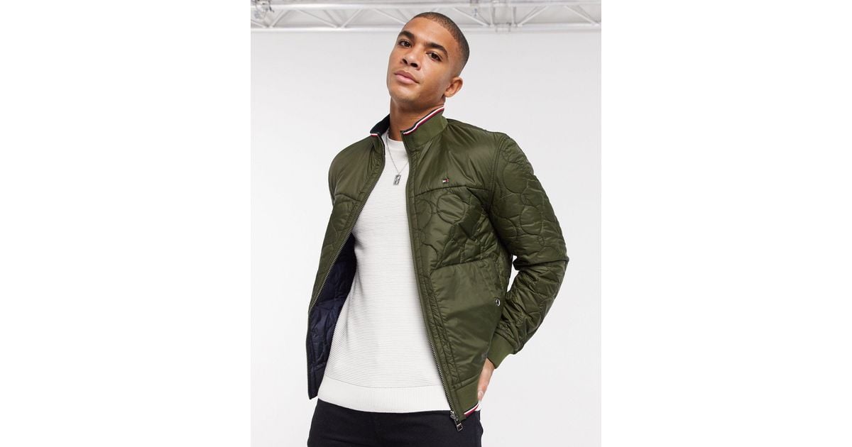 Tommy Hilfiger – Gesteppte Wende-Bomberjacke in Grün für Herren