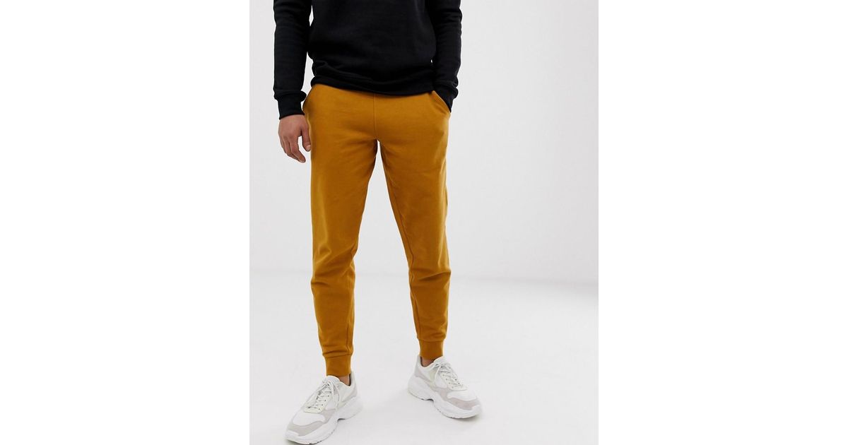 ASOS Tapered Sweatpants In Mustard in 