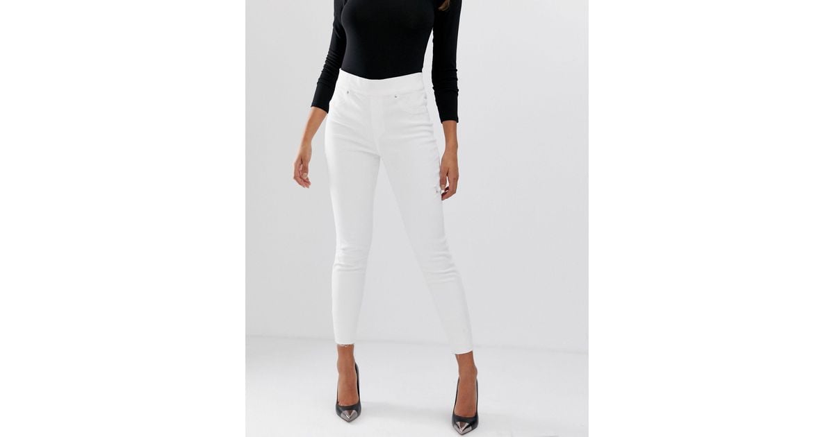 Spanx Shape And Lift Distressed Skinny Jeans in White