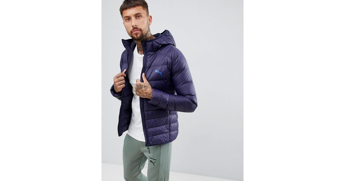 puma packable hooded jacket in black