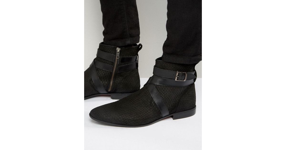 chelsea boots with strap