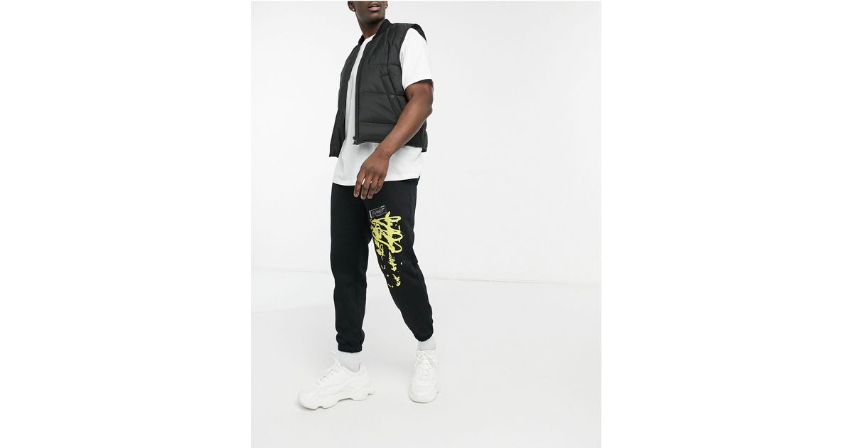 Pull&Bear joggers With Reverse Print in Black for Men - Lyst