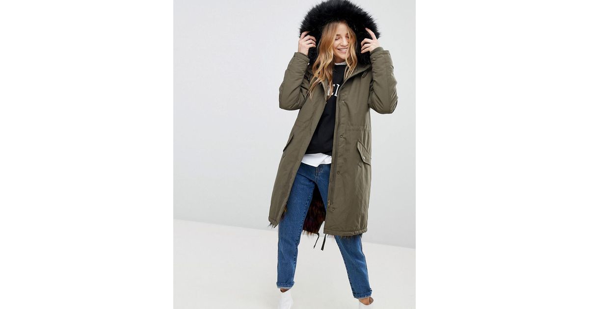 green fur lined parka