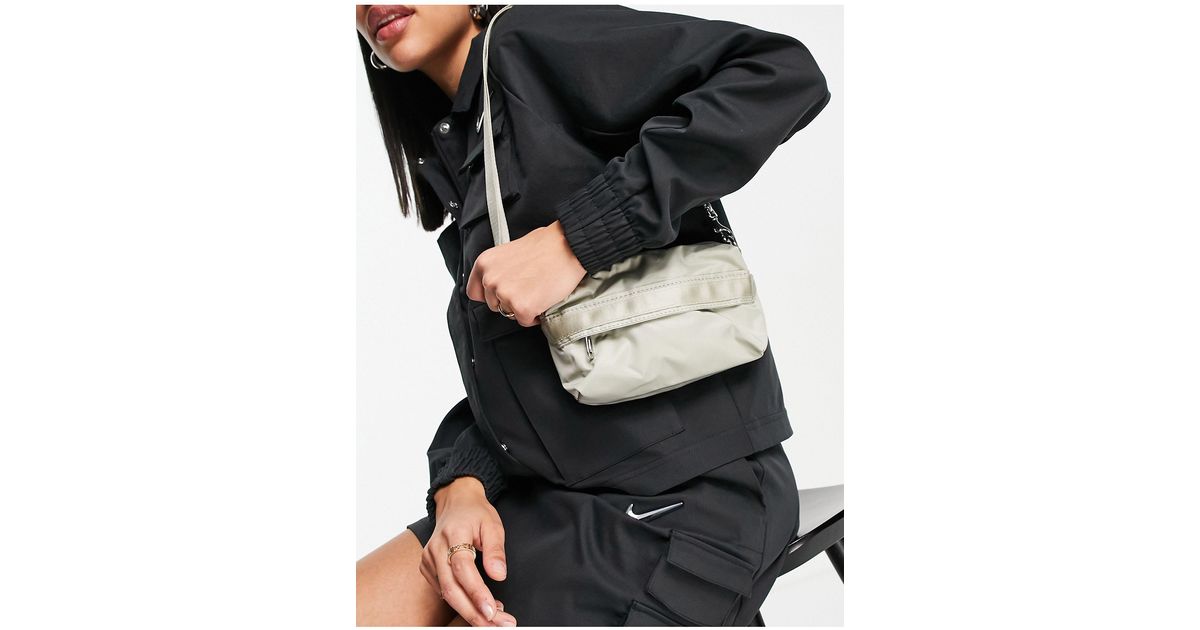 Nike Futura Luxe cross body multi pocket bag in stone