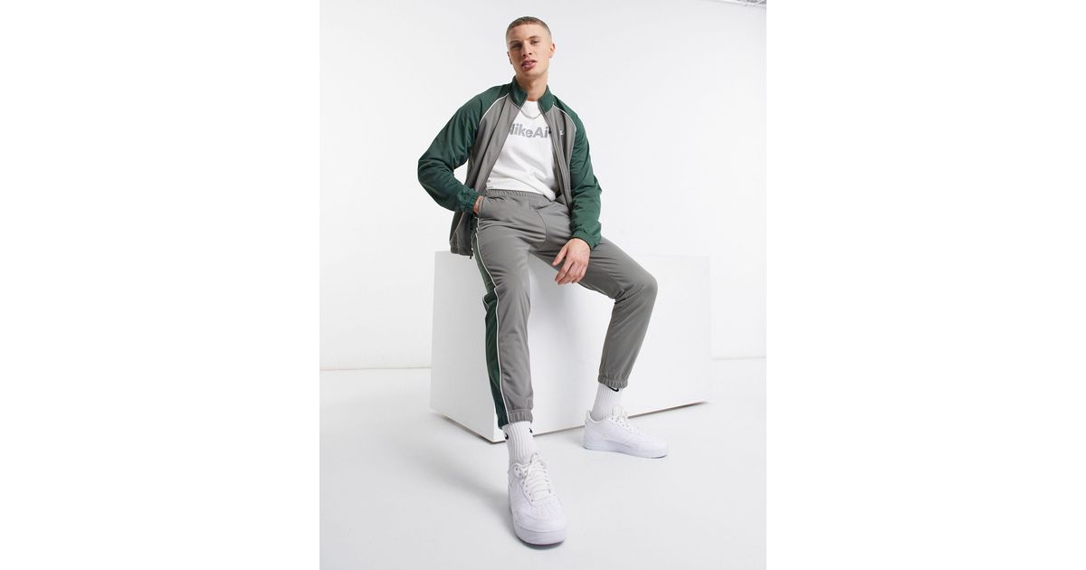 nike club polyknit tracksuit set in grey