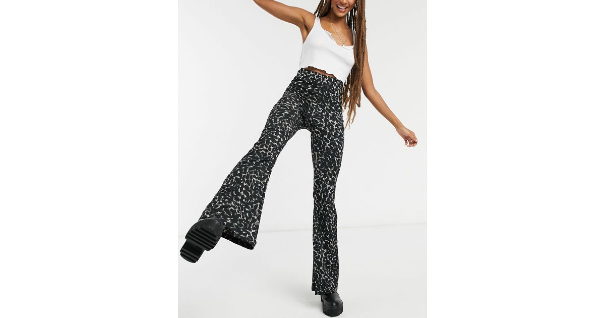 TOPSHOP Camo Flare Trousers in Green | Lyst
