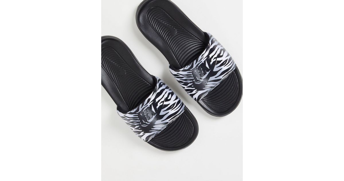 nike animal print sliders