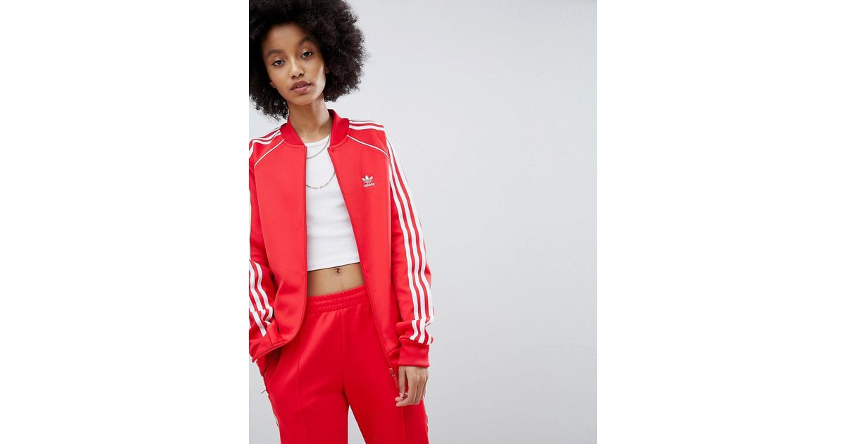 adidas originals adicolor three stripe track jacket in green