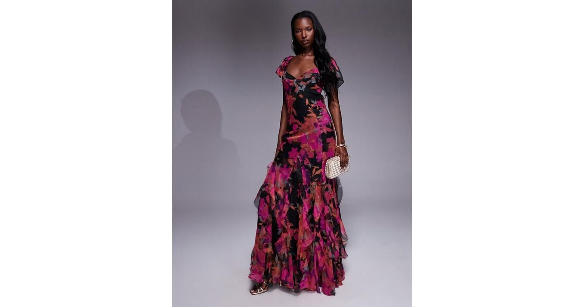 asos design flutter sleeve ruffle godet maxi dress in aubergine ASOS DESIGN flutter sleeve ruffle midi dress with cut out in purple
