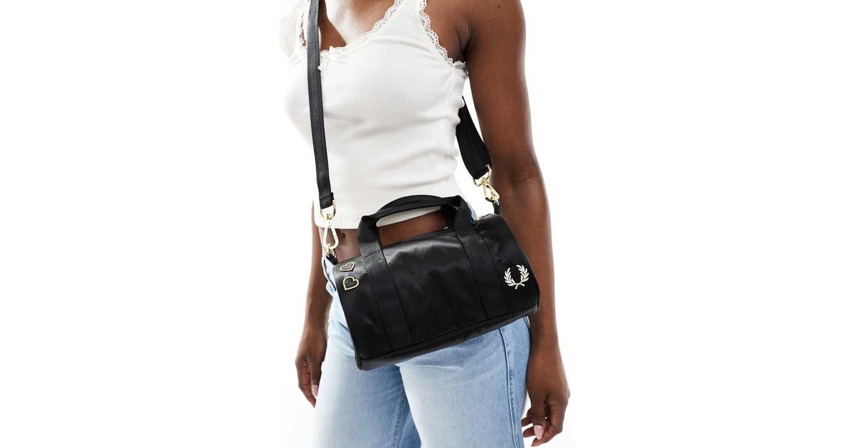 Fred Perry X Amy Winehouse Mini Satin Barrel Bag in Black | Lyst UK