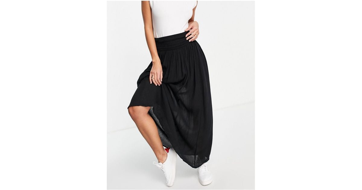 Falda larga con panel fruncido en tejido arrugado ASOS de color Negro | Lyst