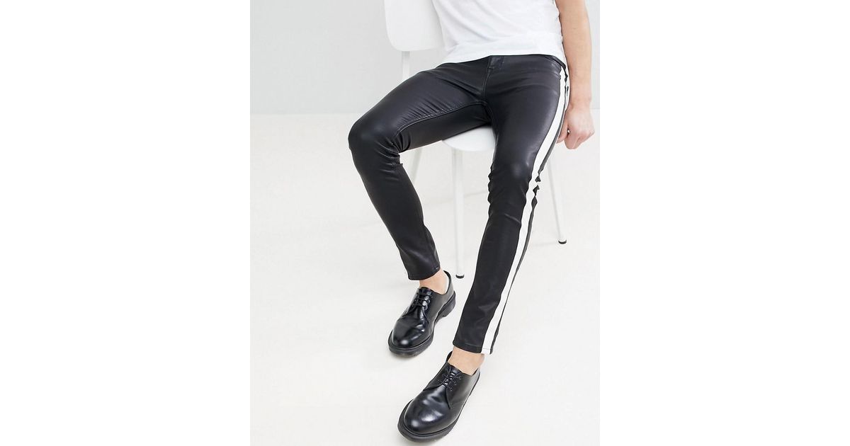 black jeans with white side stripe